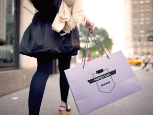 Paper Bag Held in Hand Mockup PSD